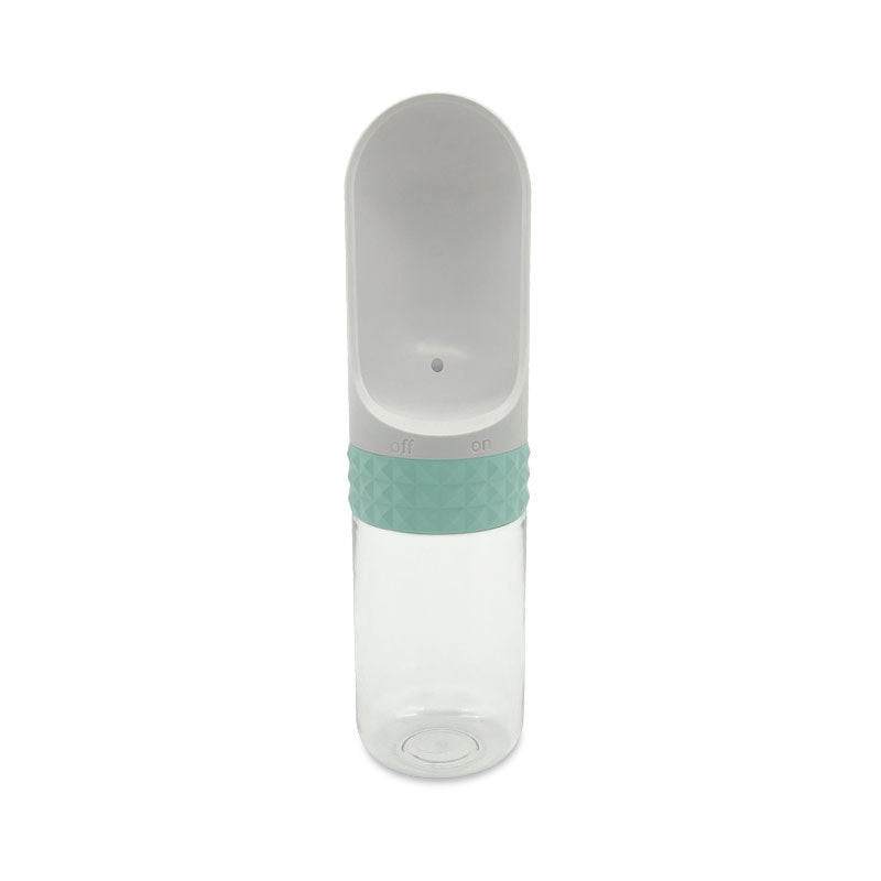 Clear water bottle with a gray cap and green base on a white background